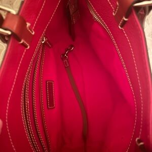 Like new pebble grain red Dooney and bourke